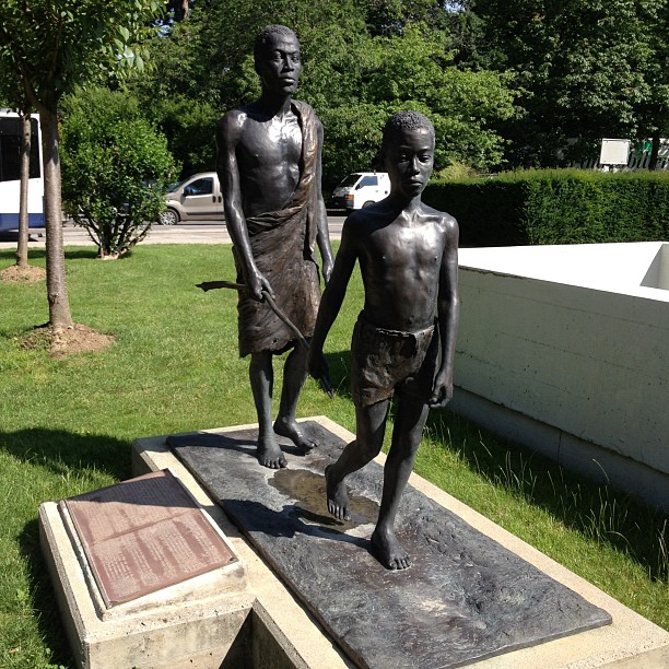 Child leading blind elder