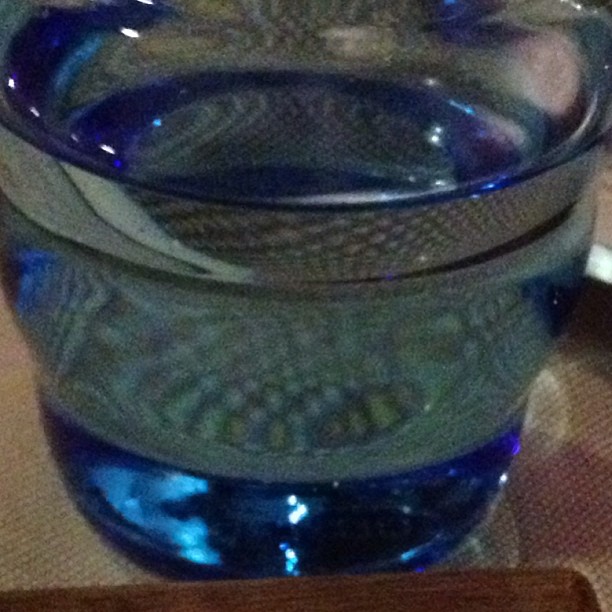 A glass of water.