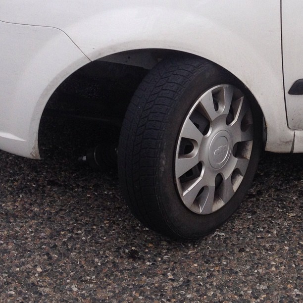What amused me about this situation is that the woman's  right hand front tire suspension became detached. Poor maintenance...