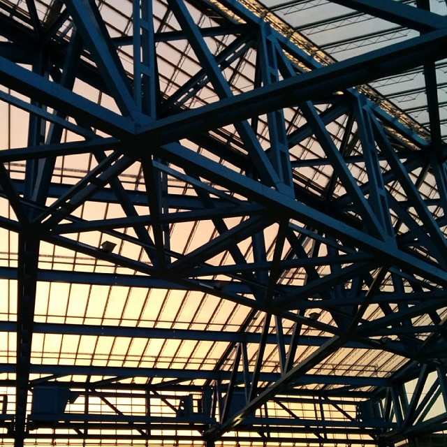 Sunset through a steel frame