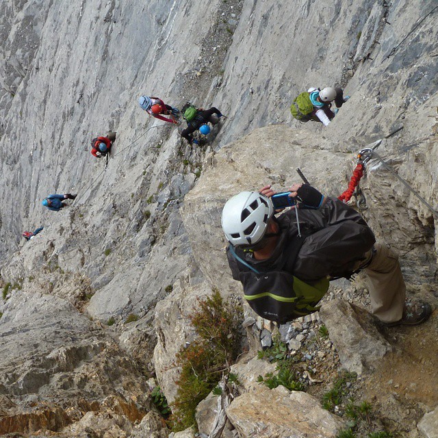 Climbing a via ferrata.