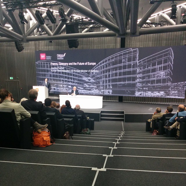 Joschka fischer speaking in Geneva speaking about Poland.