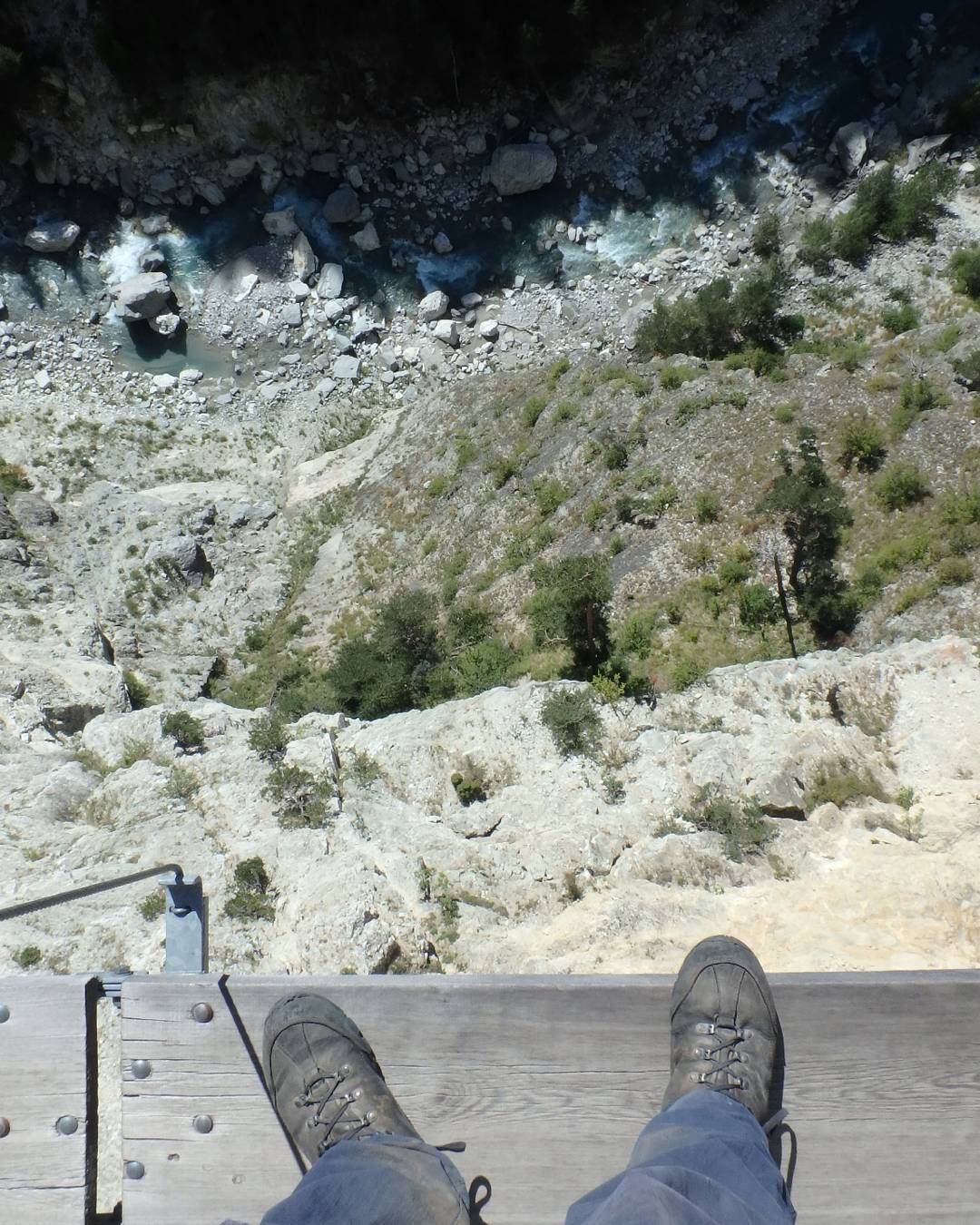 Enjoying the view from a bridge.