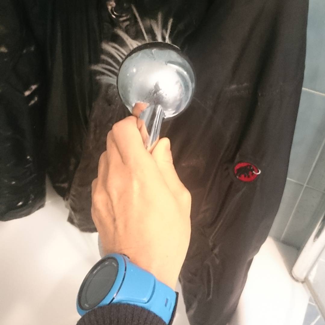 Cleaning my coat after caving.