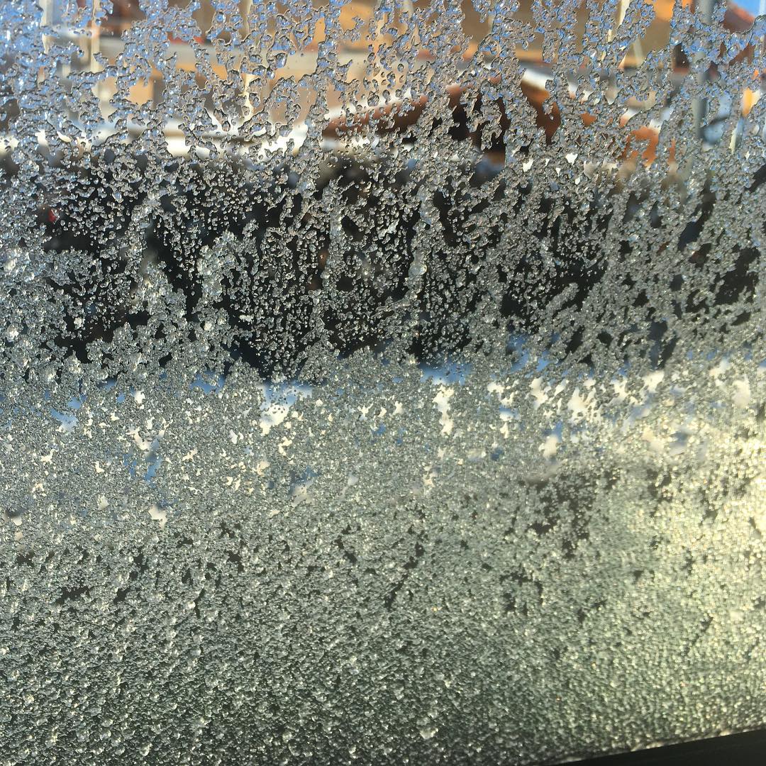 What your left window looks like after driving across snow drifts.