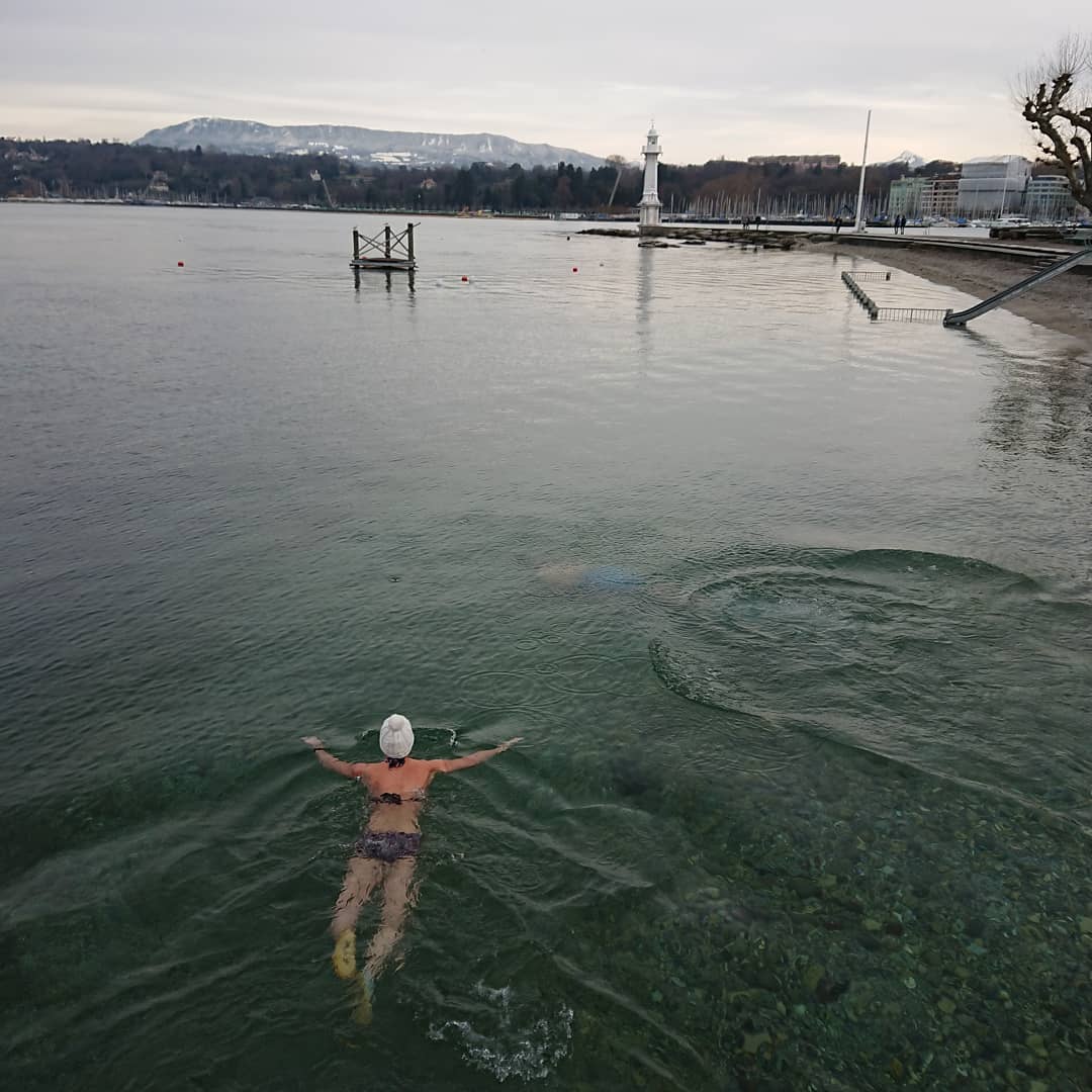 My fingers are cold and these people are swimming.