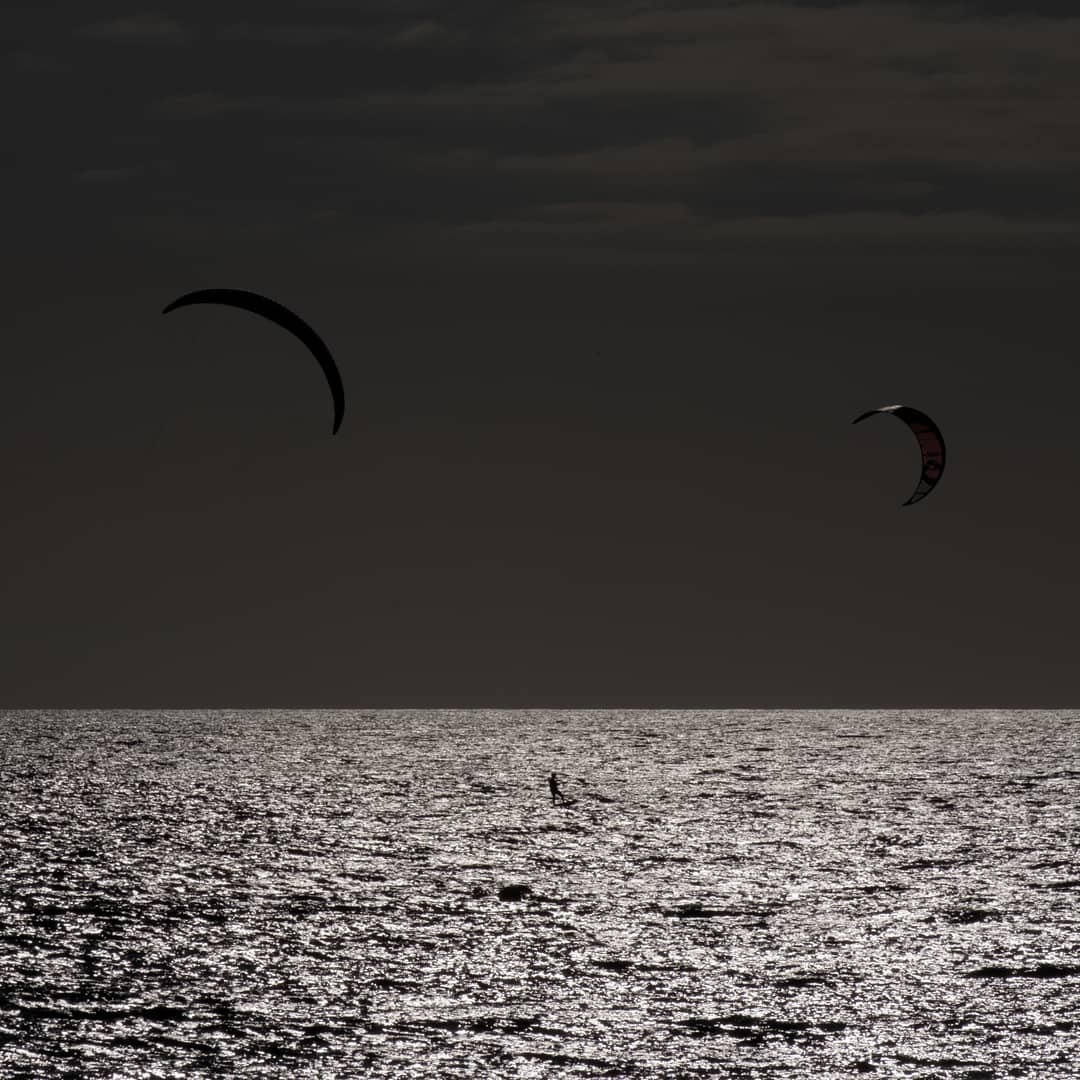 Kite surfers.
