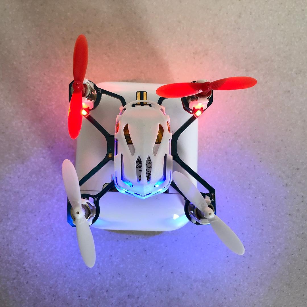 Nano q4 resting on airpod charging box. I love this little drone. They have improved it.
