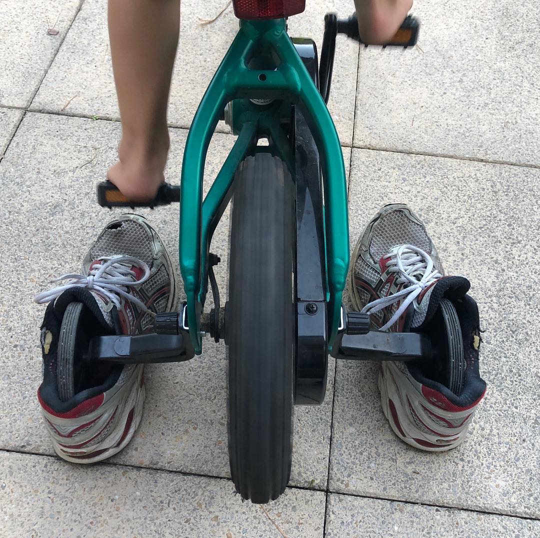 Home trainer for bikes with training wheels.
