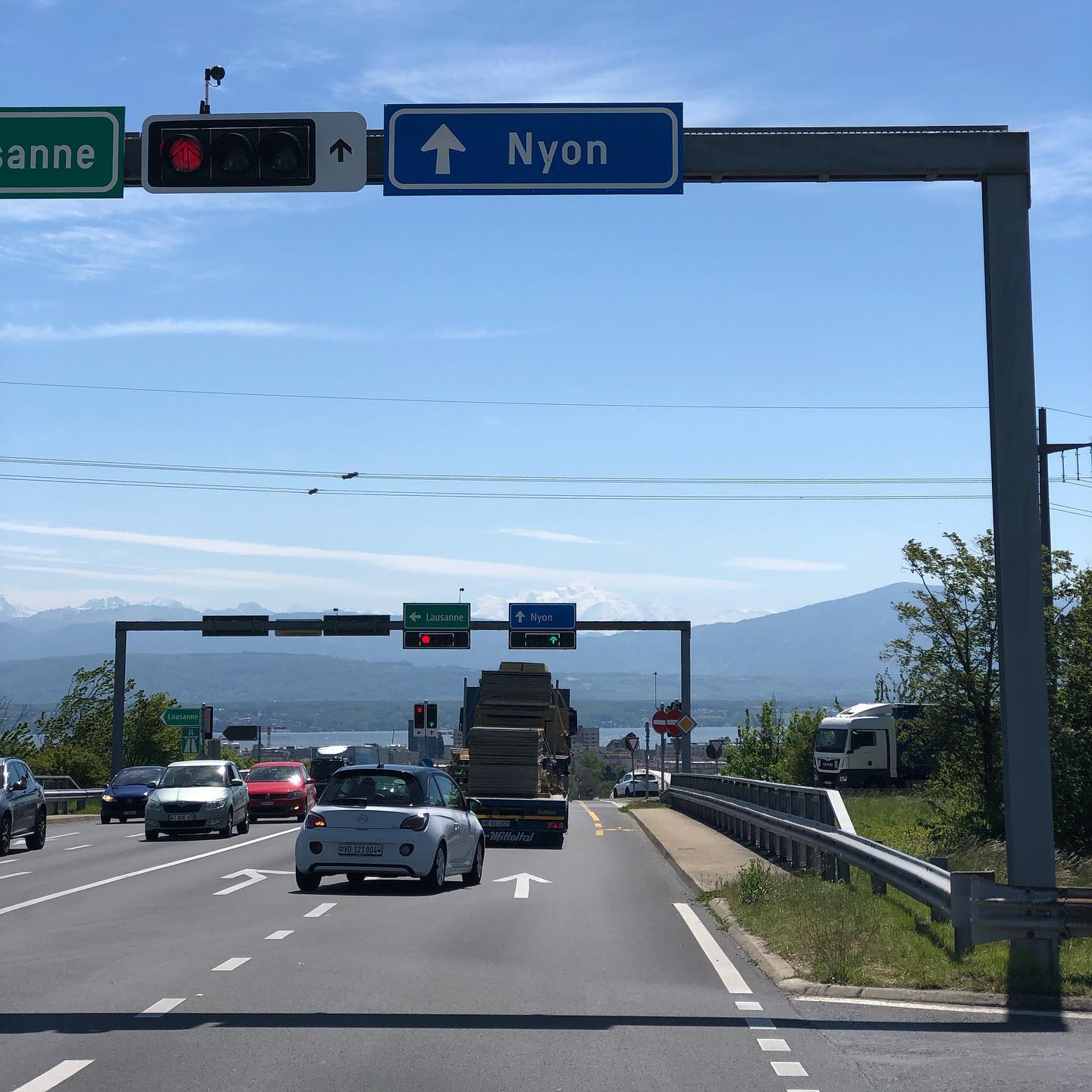 The view from the traffic lights around here. See the Mont Blanc in the background?