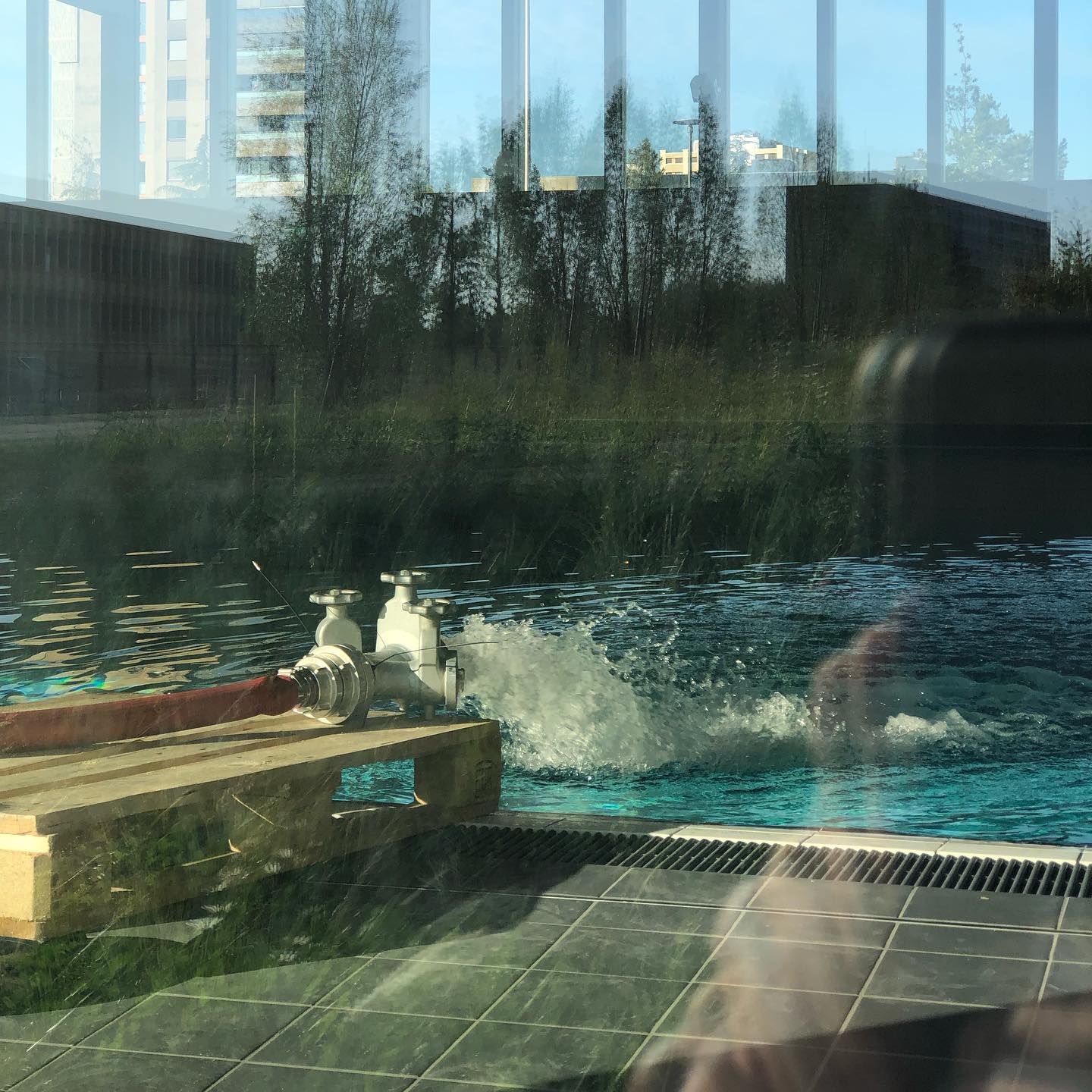 Filling a pool that was closed for cleaning.