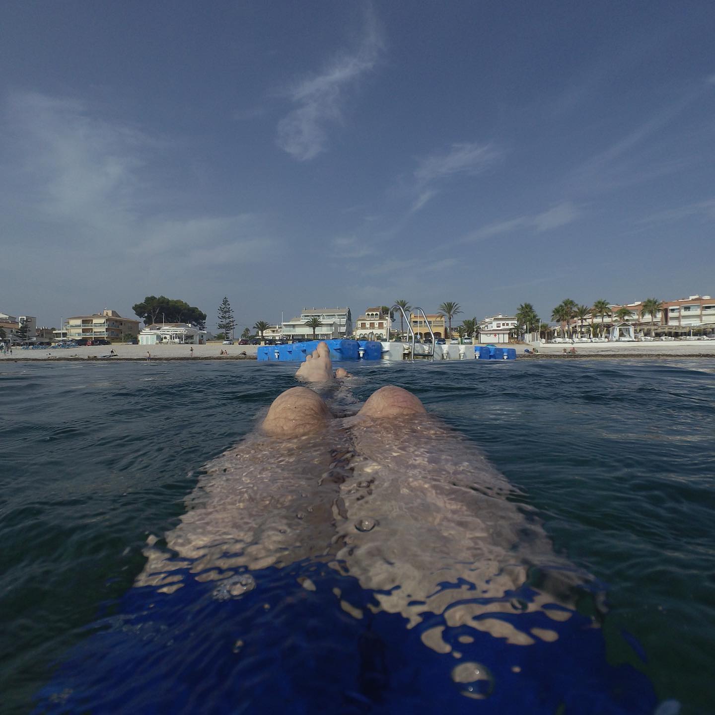 Not all legs are vegetating on the beach.