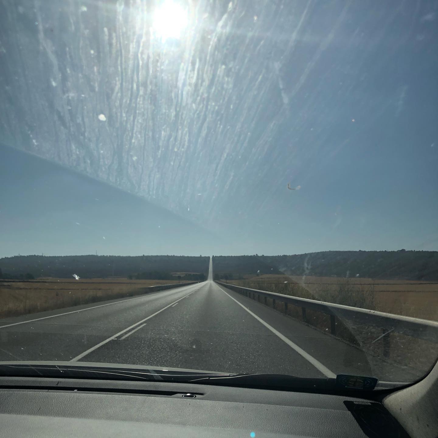 Long straight road. Possibly Roman by guess, not fact check.