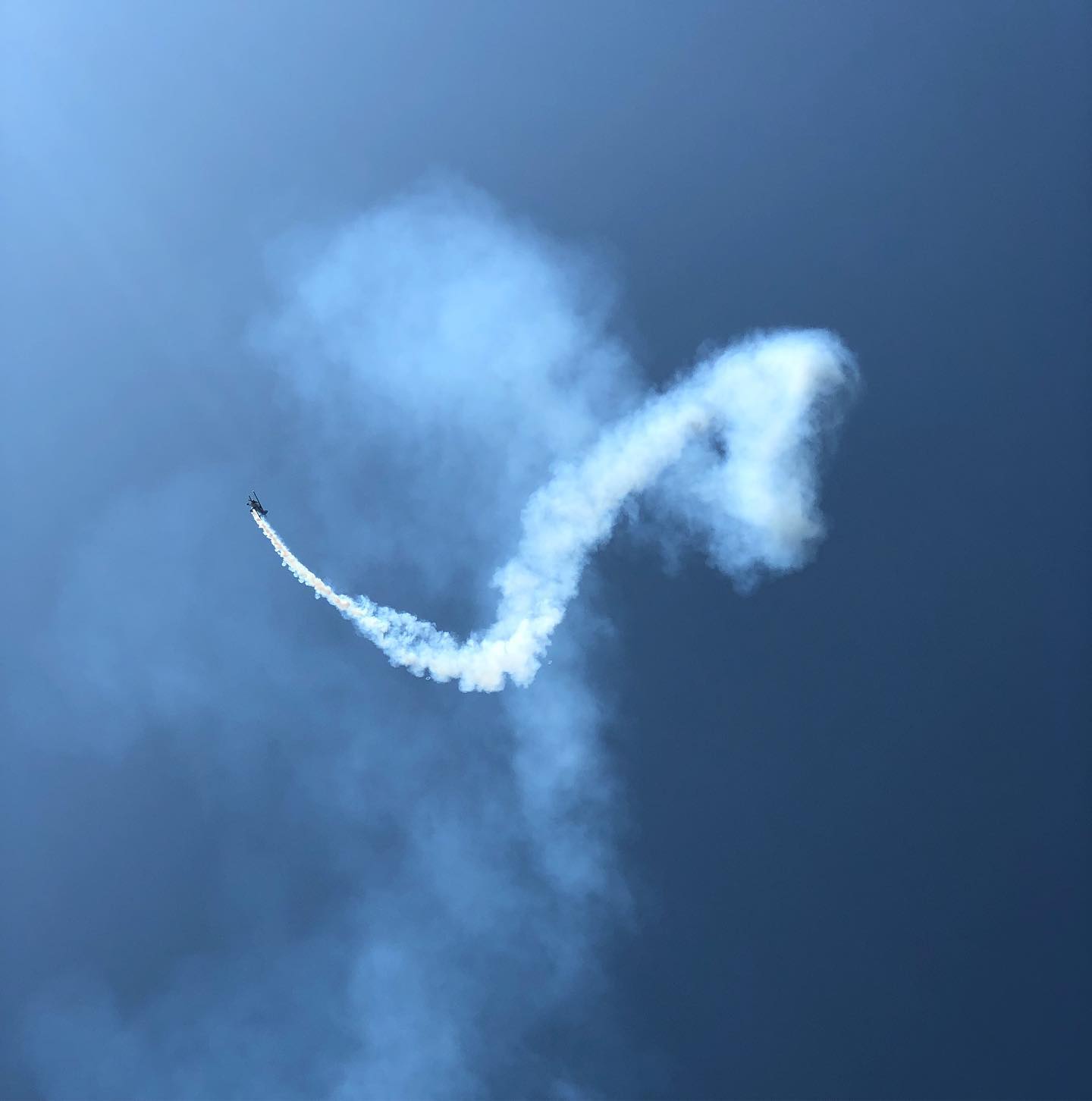 Playing with a flying smoke machine.