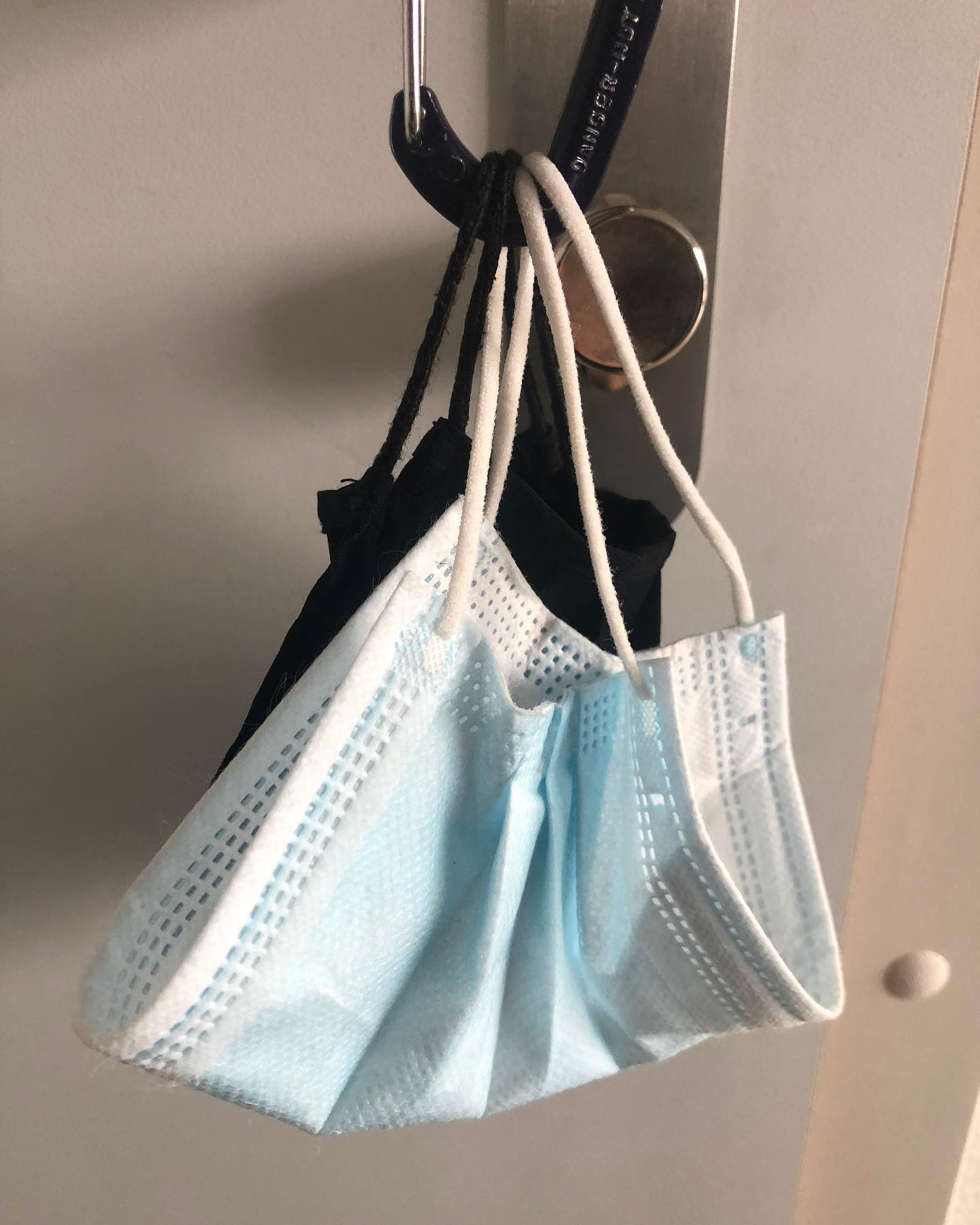 What carabiners are for during a pandemic. Normally one is within the other. I donât wear mine as a beard. Iâm not that disorganised.